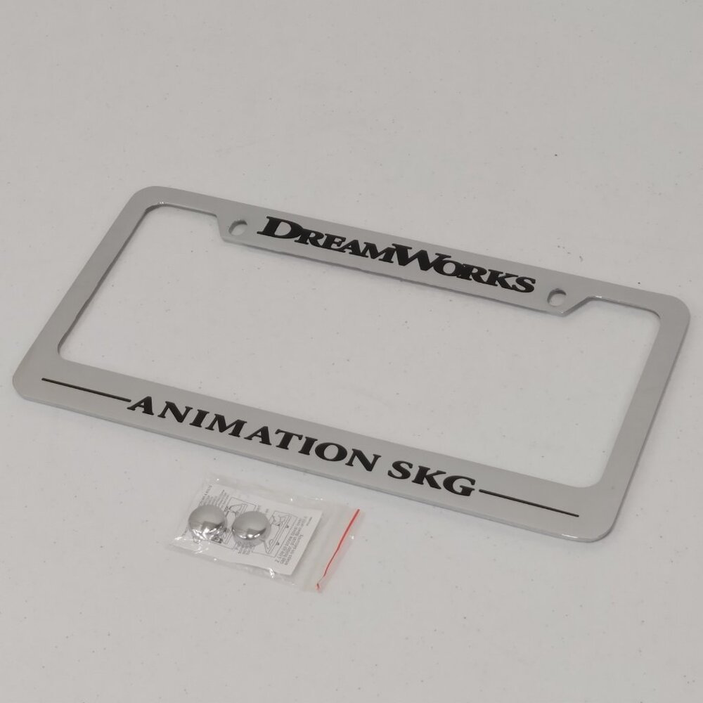 License Plate Metal Polished Chrome Frame DreamWorks Animation SKG NEW